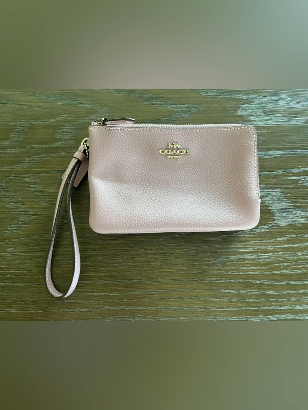 COACH Pebbled Leather Wristlet in Mauve
